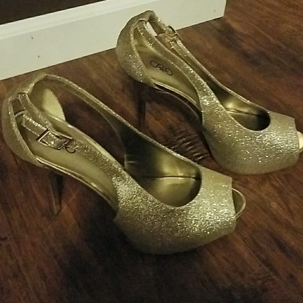 Gold sparkle high heels